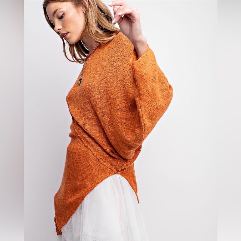 ASYMMETRICAL BOTTOM TUNIC SWEATER